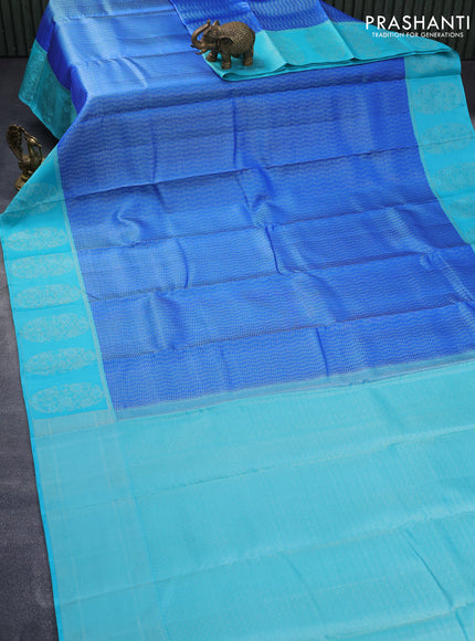 Pure kanjivaram silk saree blue and teal blue shade with allover silver zari woven brocade weaves and silver zari woven border