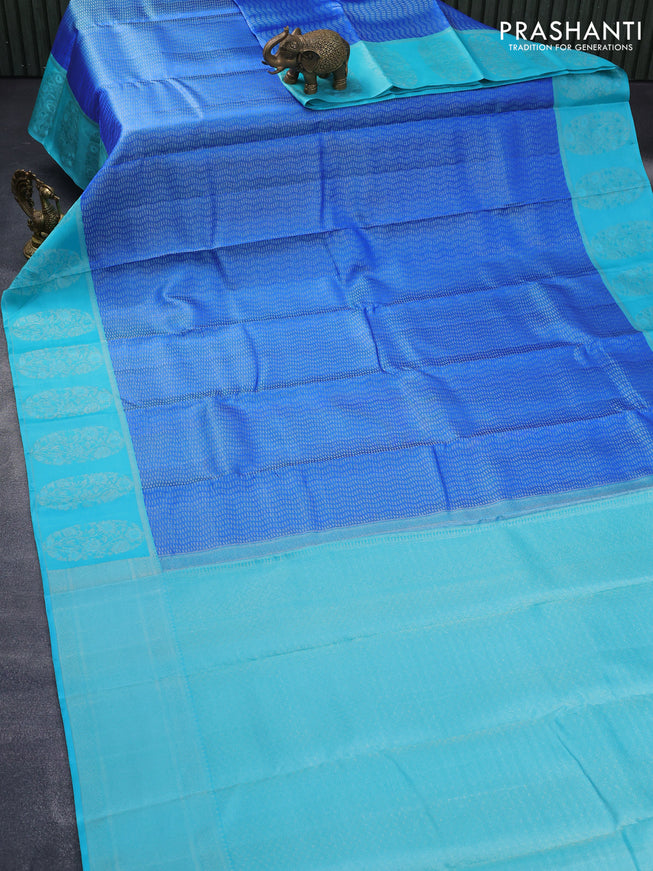 Pure kanjivaram silk saree blue and teal blue shade with allover silver zari woven brocade weaves and silver zari woven border