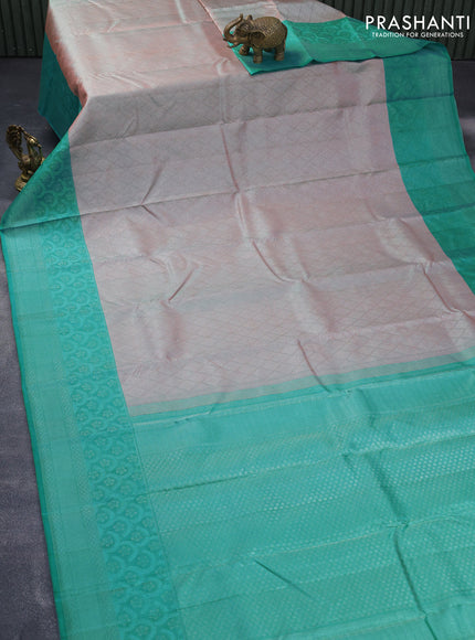 Pure kanjivaram tissue silk saree dual shade of peach and teal blue with allover silver zari weaves and long silver zari woven border