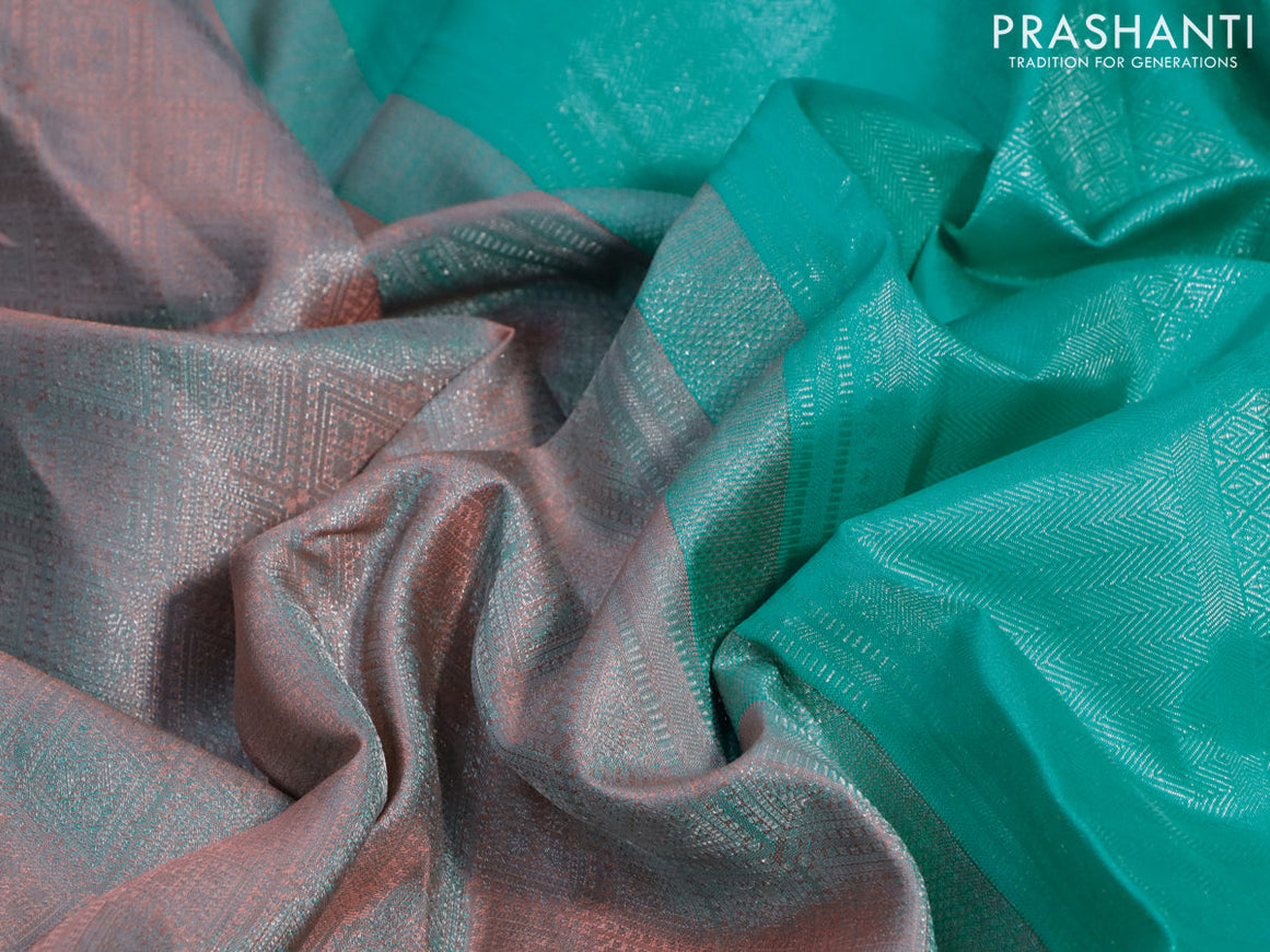 Pure kanjivaram tissue silk saree dual shade of peach and teal blue with allover silver zari weaves and long silver zari woven border