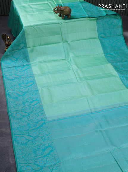 Pure kanjivaram tissue silk saree teal blue and cs blue with allover silver zari weaves and long silver zari woven border