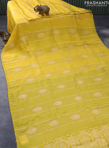 Satin crepe silk saree yellow and sap green with allover zari weaves & elephant zari buttas and beaded work border