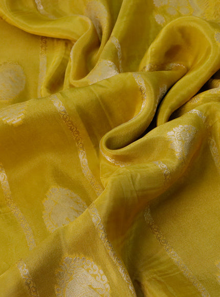 Satin crepe silk saree yellow and sap green with allover zari weaves & elephant zari buttas and beaded work border