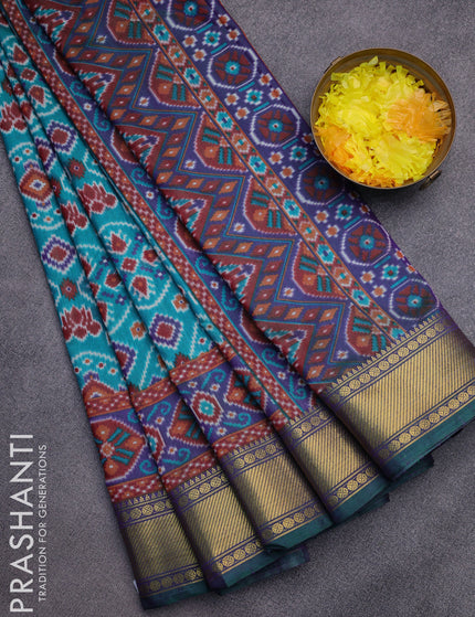 Semi tussar saree teal green and dual shade of blue with allover ikat prints and zari woven border