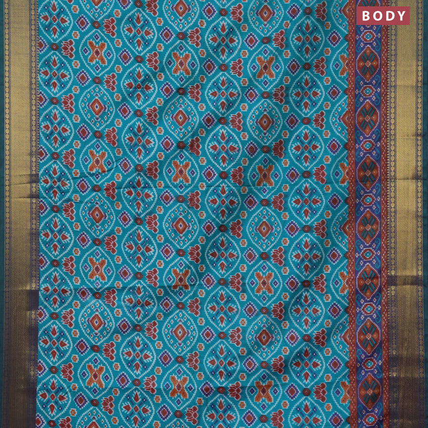 Semi tussar saree teal green and dual shade of blue with allover ikat prints and zari woven border