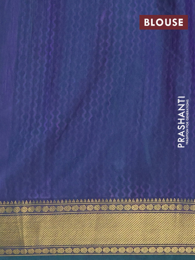 Semi tussar saree teal green and dual shade of blue with allover ikat prints and zari woven border