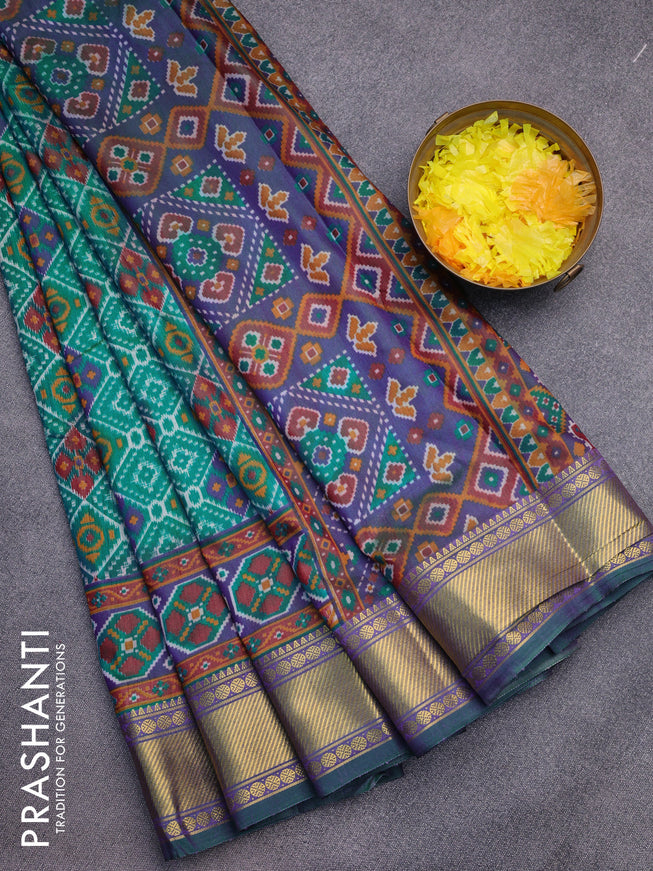 Semi tussar saree teal green and dual shade of blue with allover ikat prints and zari woven border