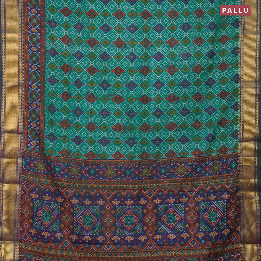 Semi tussar saree teal green and dual shade of blue with allover ikat prints and zari woven border