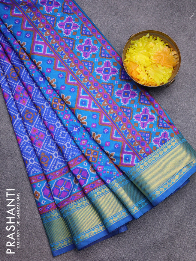 Semi tussar saree blue and cs blue with allover ikat prints and zari woven border