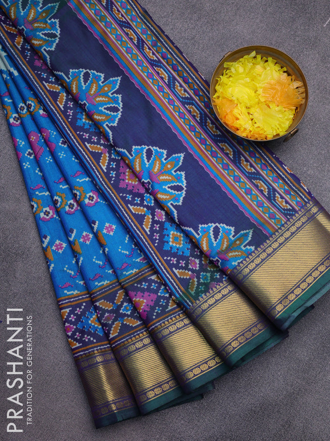 Semi tussar saree cs blue and dual shade of bluish green with allover ikat prints and zari woven border