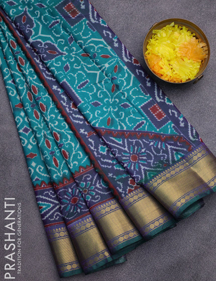 Semi tussar saree teal green and dual shade of bluish green with allover ikat prints and zari woven border