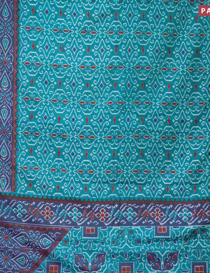 Semi tussar saree teal green and dual shade of bluish green with allover ikat prints and zari woven border