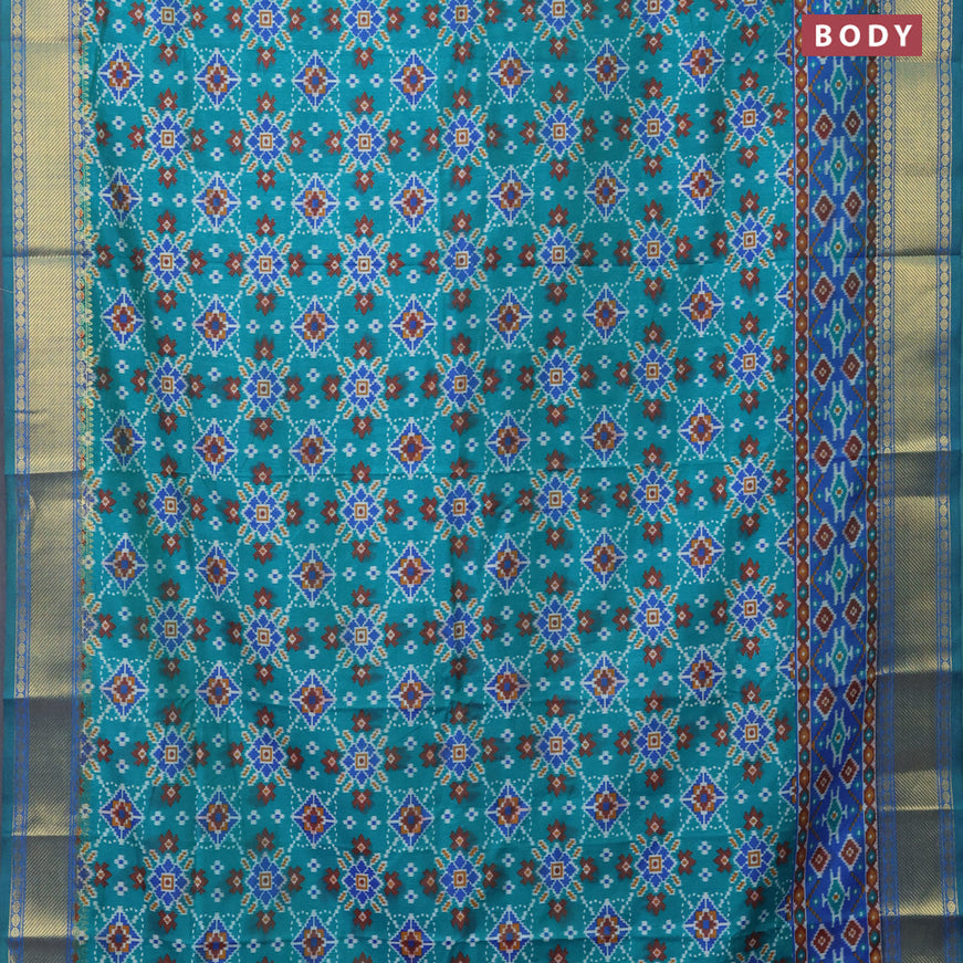 Semi tussar saree teal green and dual shade of blue with allover ikat prints and zari woven border