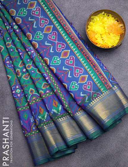 Semi tussar saree teal green and dual shade of blue with allover ikat prints and zari woven border