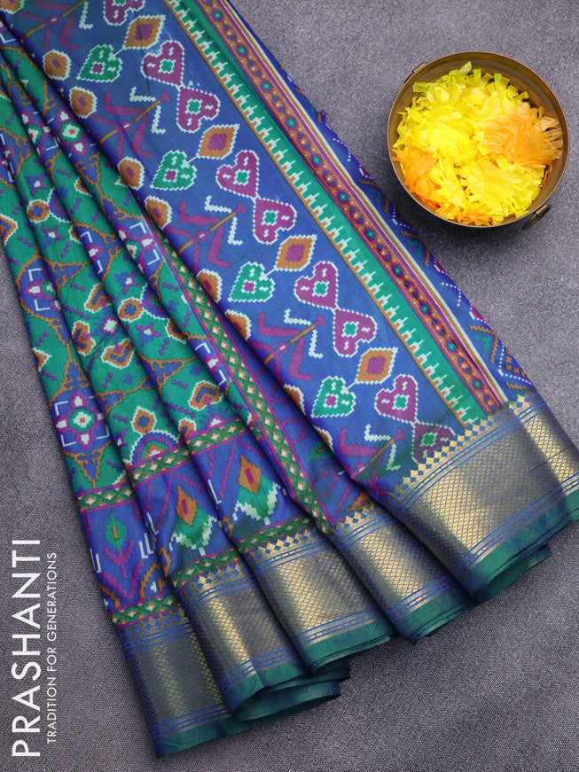 Semi tussar saree teal green and dual shade of blue with allover ikat prints and zari woven border