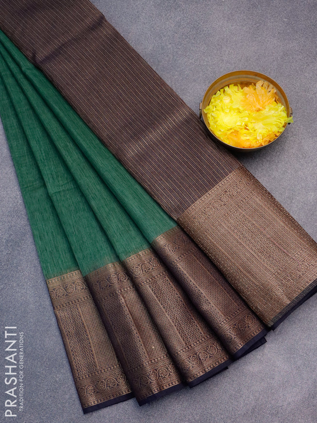 Banarasi semi matka saree green shade and dark navy blue with plain body and antique zari border