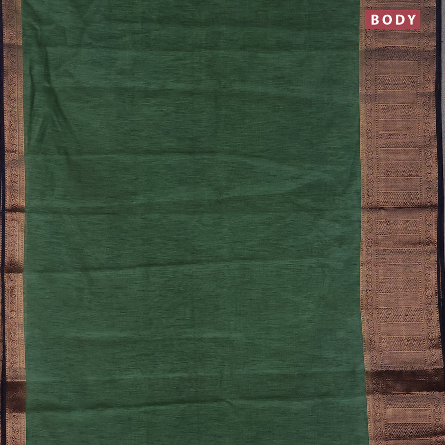 Banarasi semi matka saree green shade and dark navy blue with plain body and antique zari border