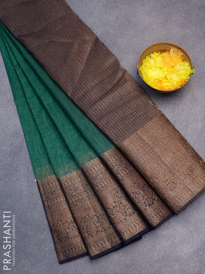 Banarasi semi matka saree green shade and navy blue with plain body and long antique zari border