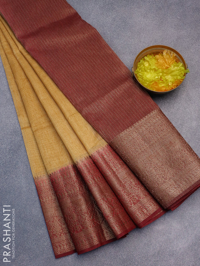 Banarasi semi matka saree sandal and maroon with plain body and long antique zari border