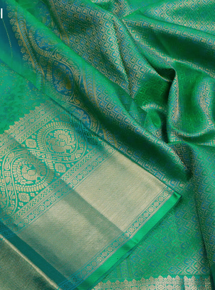 Pure kanjivaram silk saree dual shade of green with allover zari woven brocade weaves and long zari woven border