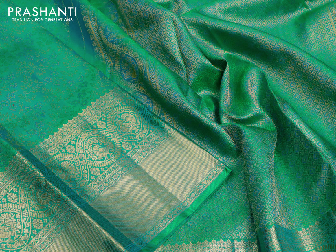 Pure kanjivaram silk saree dual shade of green with allover zari woven brocade weaves and long zari woven border