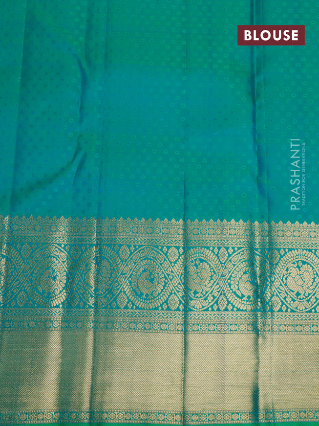 Pure kanjivaram silk saree dual shade of green with allover zari woven brocade weaves and long zari woven border