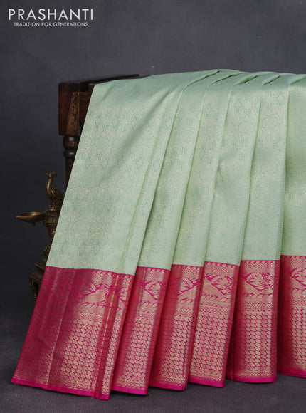 Pure kanjivaram silk saree pista green and pink with allover silver zari woven brocade weaves and long zari woven border