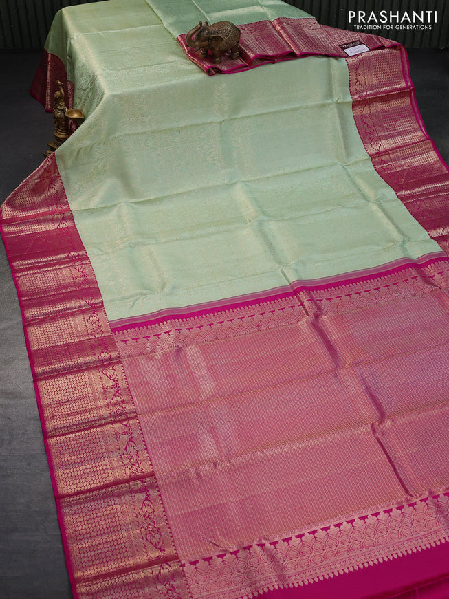 Pure kanjivaram silk saree pista green and pink with allover silver zari woven brocade weaves and long zari woven border