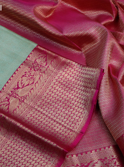 Pure kanjivaram silk saree pista green and pink with allover silver zari woven brocade weaves and long zari woven border