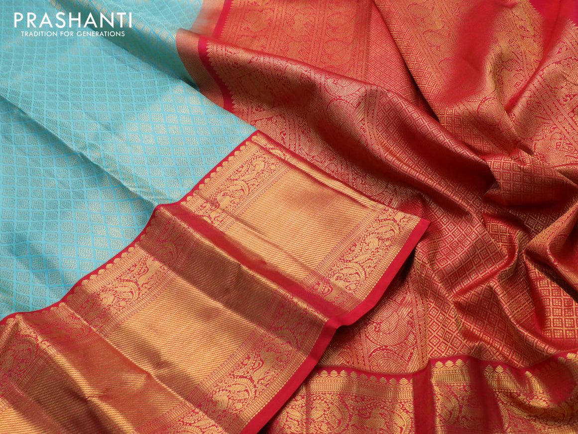 Pure kanjivaram silk saree light blue and red with allover zari woven brocade weaves and long zari woven border