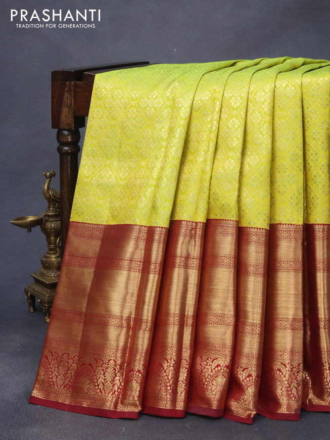 Pure kanjivaram silk saree fluorescent green and maroon with allover zari woven brocade weaves and long zari woven border