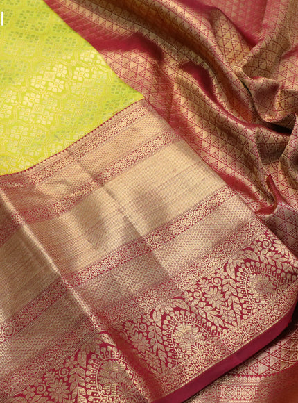 Pure kanjivaram silk saree fluorescent green and maroon with allover zari woven brocade weaves and long zari woven border