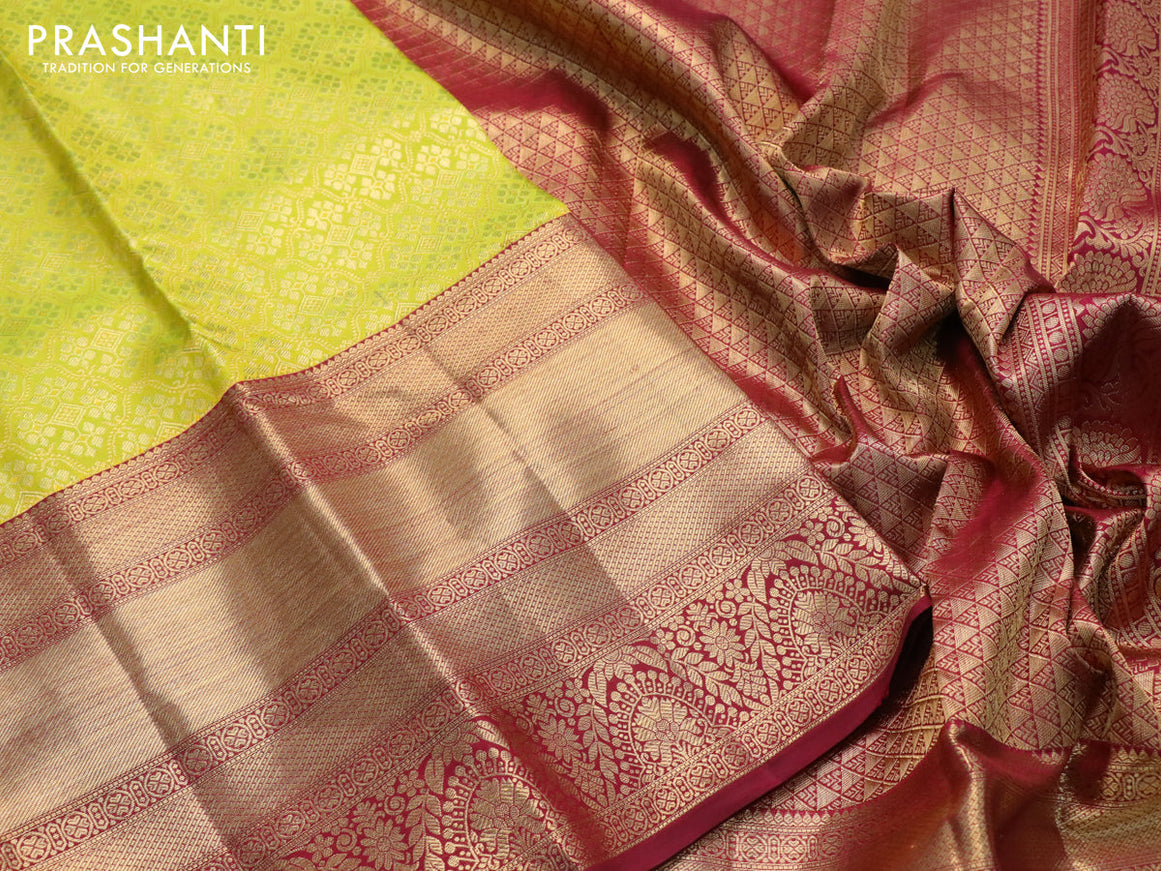 Pure kanjivaram silk saree fluorescent green and maroon with allover zari woven brocade weaves and long zari woven border