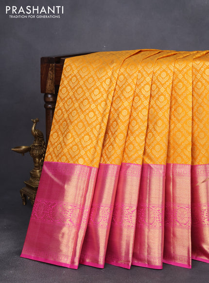 Pure kanjivaram silk saree mustard yellow and pink with allover zari woven brocade weaves and long zari woven border