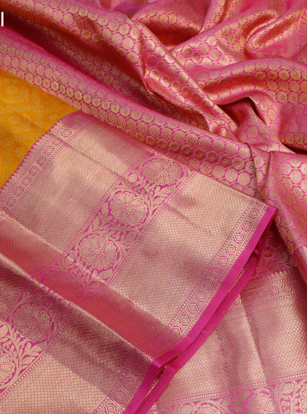 Pure kanjivaram silk saree mustard yellow and pink with allover zari woven brocade weaves and long zari woven border