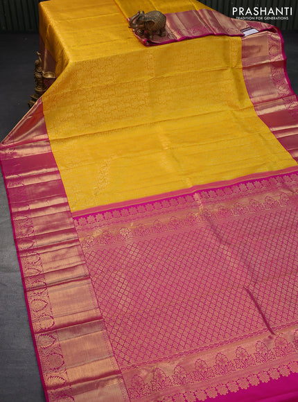 Pure kanjivaram silk saree yellow and pink with allover zari woven brocade weaves and long zari woven border