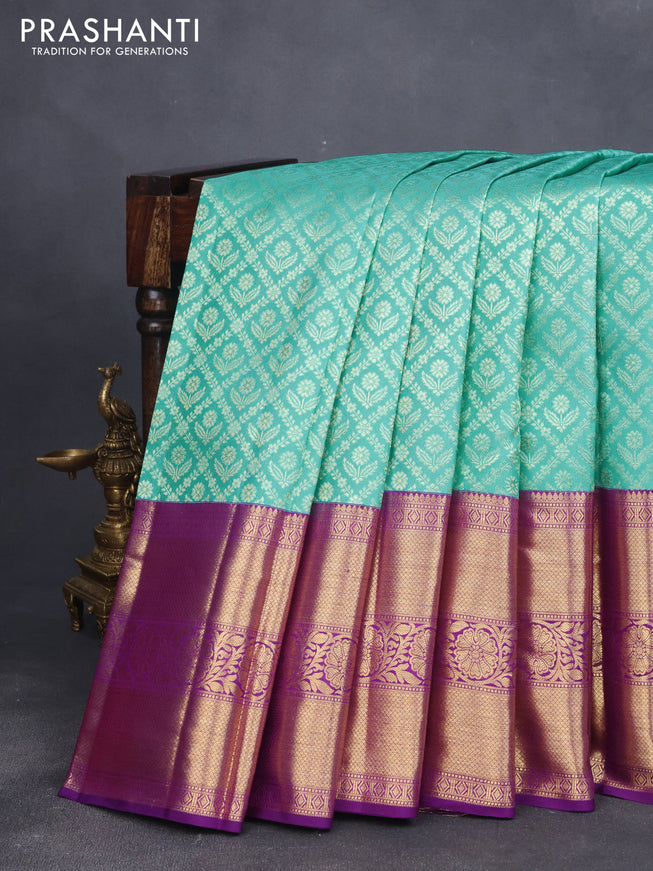 Pure kanjivaram silk saree light blue and violet with allover zari woven brocade weaves and long zari woven border