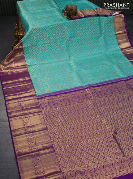 Pure kanjivaram silk saree light blue and violet with allover zari woven brocade weaves and long zari woven border