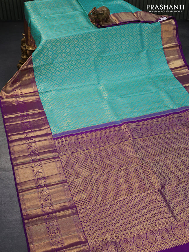 Pure kanjivaram silk saree light blue and violet with allover zari woven brocade weaves and long zari woven border