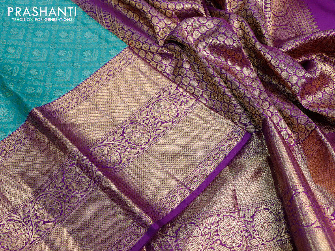 Pure kanjivaram silk saree light blue and violet with allover zari woven brocade weaves and long zari woven border