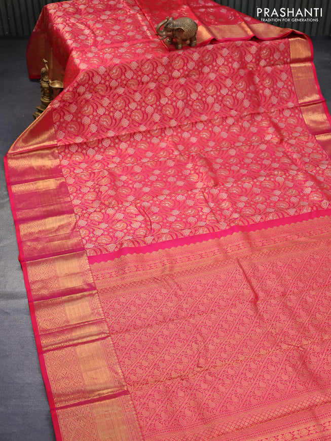 Pure kanjivaram silk saree dual shade of pink with allover zari woven floral brocade weaves and long zari woven border