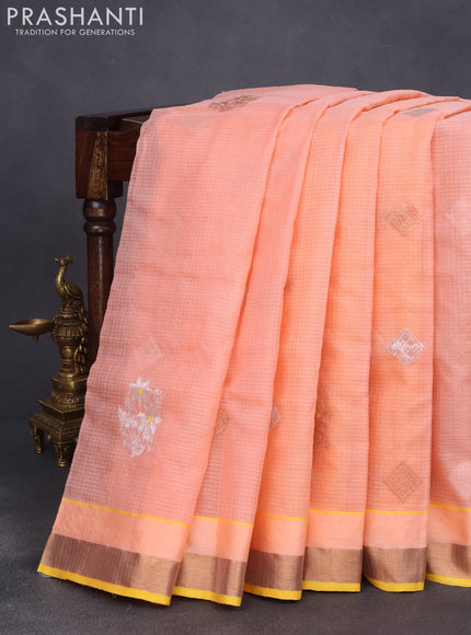 Pure zari kota saree peach orange and yellow with allover copper zari weaves and copper zari woven border