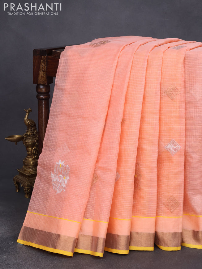 Pure zari kota saree peach orange and yellow with allover copper zari weaves and copper zari woven border