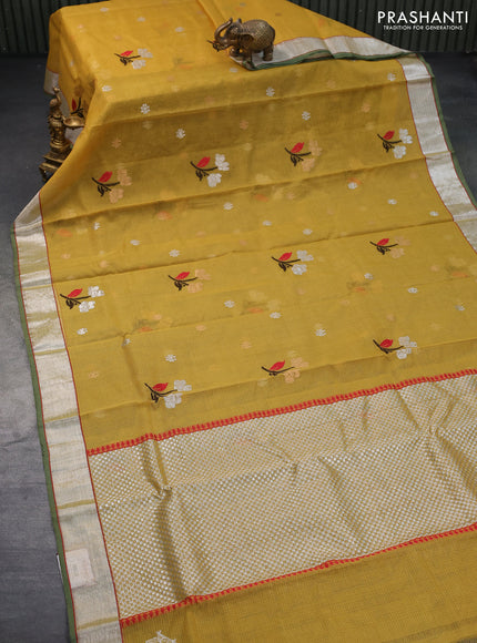 Pure zari kota saree mustard green and pastel green shade with thread & zari woven buttas and silver zari woven border