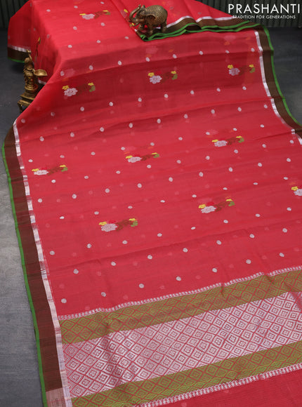 Pure zari kota saree tomato red and green with silver zari woven buttas and silver zari woven simple border