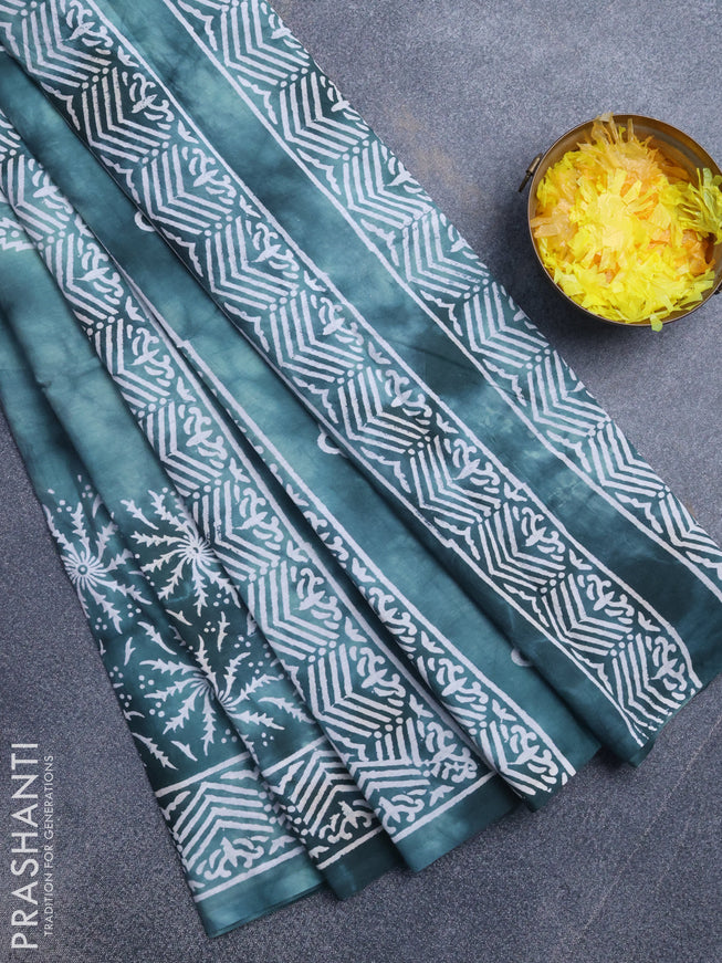 Jaipur cotton saree pastel green shade with tie & dye butta prints and printed border