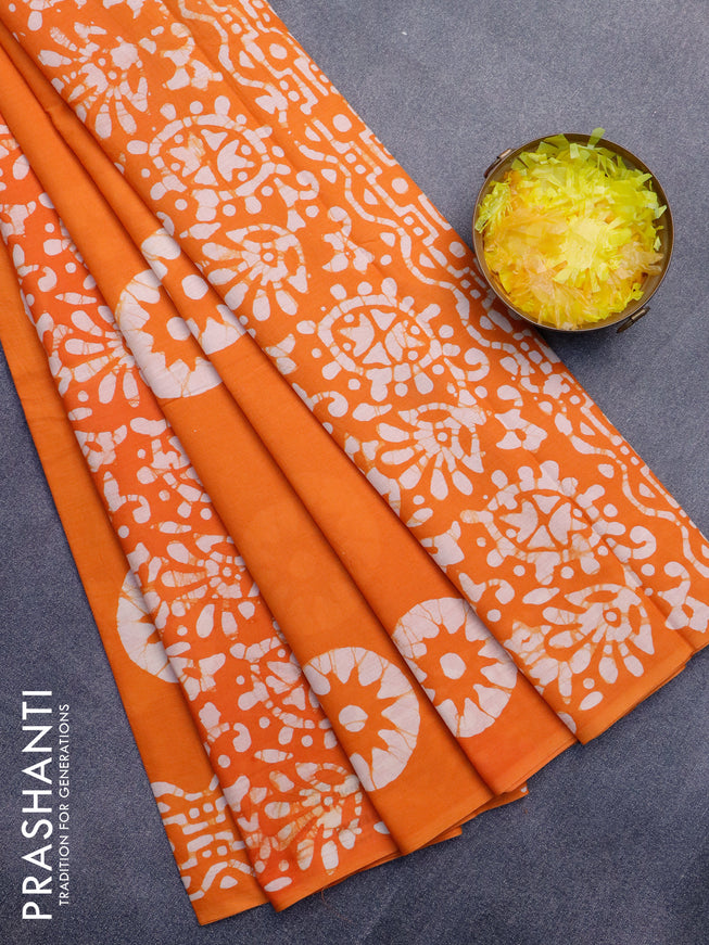 Jaipur cotton saree orange with allover batik prints in borderless style