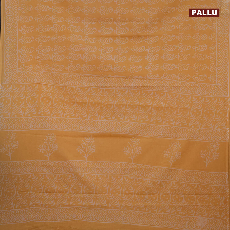 Jaipur cotton saree pale orange with allover paisley prints and printed border