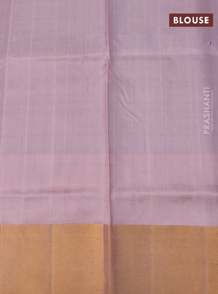 Pure uppada silk saree dark blue and peach pink with allover zari woven floral buttas and zari woven border