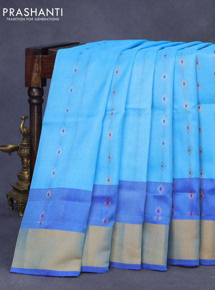 Pure uppada silk saree light blue and blue with allover zari woven floral buttas and zari woven border